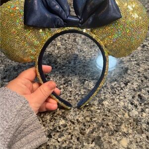 Disney Gold Sequin Minnie Ear Headband with Navy Bow